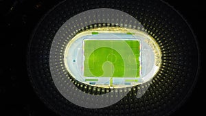 Static Drone shot of Dynamo Kyiv Football Stadium in the capital of Ukraine. Bird's eye view on illuminated Olympic