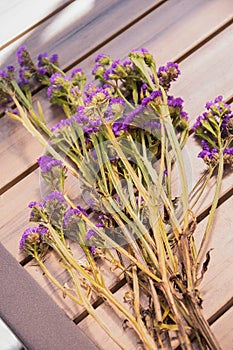 Statice flower sprigs on a Table.