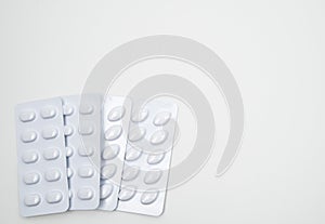Statins tablets pill in white blister pack photo