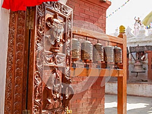 Stationary prayer wheels at Boudhanath, Kathmandu, Nepal