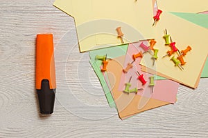 Stationary, Pushpins on Stickers, Orange Highlighter on White Wooden Background. Business Planning Strategy Concept.