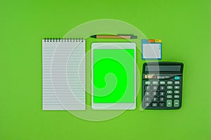 Stationery, green screen tablet, on green background