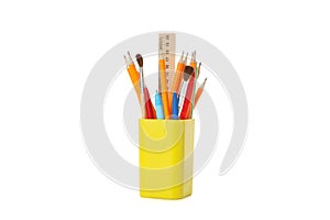 Stationery in holder isolated on background