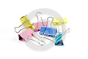 Stationery metallic colored binder clips. Close up. on