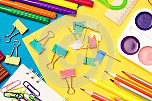 Stationery. School and office supplies on a colored background. Selective focus