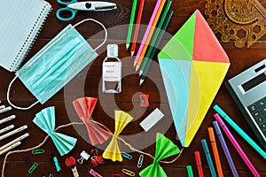 Stationery school supplies a mouth mask and  liquid hand sanitizer