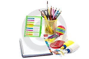 Stationery and school supplies on white background.