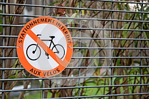 Stationnement interdit aux velos french text sign means parking prohibited for bicycles