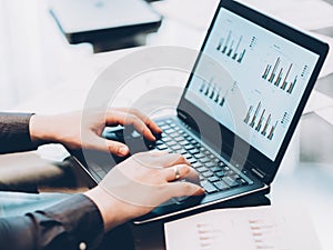 Statistics analysis business man laptop graphs