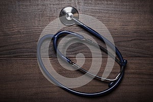 Statoscope over brown wooden table