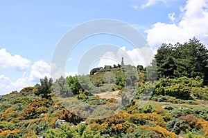 Statua San Michele on top of sardinian mountain landscape near Biddamanna IstrisÃ ili Villagrande Strisaili Arzana, Italy photo