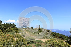 Statua San Michele on top of sardinian mountain landscape near Biddamanna Istrisàili Villagrande Strisaili Arzana, Italy