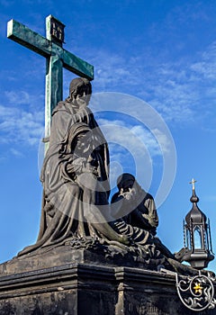 Statuary of St. Cross , Calvary , in Charles bridge, Prague.Czech Republic.