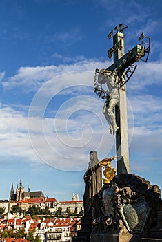 Statuary of St. Cross , Calvary , in Charles bridge, Prague.Czech Republic.