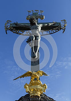 Statuary of St. Cross , Calvary , in Charles bridge, Prague.Czech Republic.