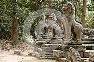 Statuary at temple at Angkor Wat, Cambodia photo