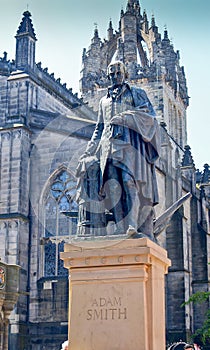 Statue of Adam Smith on Royal Mile in business district in Edinburgh