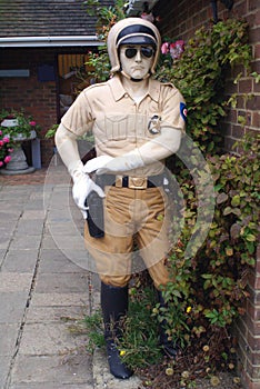 Statue of an American motorcycle cop or policeman