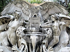 Statue amid palm trees outside University of Tampa