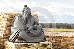 A statue of the ancestor of taoism Laozi philosopher China (Lao Tzu) photo