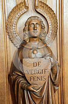 Statue of an angel at a Confessional