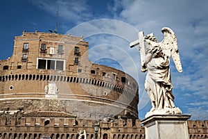 Statue of Angel with the Cross at Castel Sant`Angelo Castle of the Holy Angel, Mausoleum of Hadrian in Rome, Italy