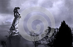 Statue of an angel in a graveyard