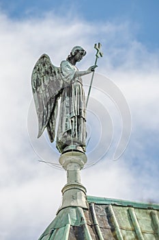 Statue of Angel at top of Cathedral Our Lady of Chartres, France photo