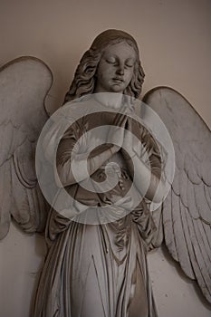 Statue of angels at the Staglieno cemetery in Genoa photo