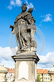 Statue of Anthony of Padua on Charles Bridge in Prague