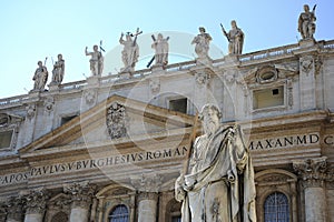 Statue of Apostle Paul in front of the St Peter`s Basilica, Vatican City Rome, Italy.