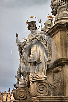 Statue of an apostle in the Plague Column in Telc