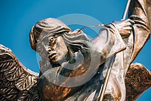 Statue Of Archangel Michael near Red Catholic