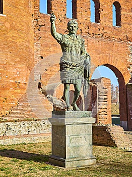 Statue of Augustus Caesar at Porta Palatina Gate. Piazza Cesare Augusto square. Turin, Piedmont, Italy