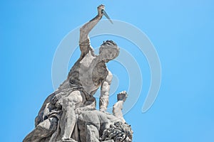 Statue of Battling Titan with a dagger at the main Gate of Hradcany Castle in Prague, Czech Republic