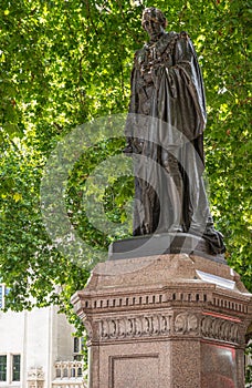 Statue of Benjamin Disraeli, Parliament Square, London, UK photo