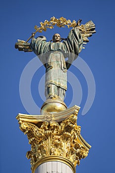 Statue of Berehynia on the top of Independence Monument on the Maidan Nezalezhnosti in Kiev, Ukraine