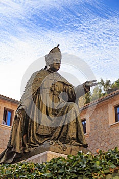 Statue of bishop Pere-Joan Campins in de lluc Monastery photo