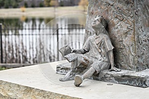 Statue of a Boy with Book - Dreaming