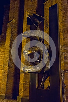 Statue of the Bremen Town Musicians in Riga, Latvia. Night landscape