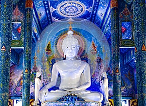 Statue of Buddha within the Blue Temple in Chian Rai Thailand