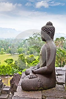 A statue of the Buddha from Borobudur on Java , Indonesia.