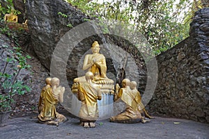 Statue of Buddha and his disciples