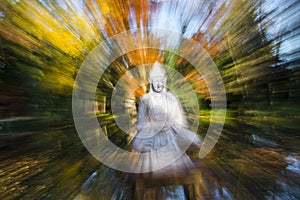Statue of Buddha in a lake in November