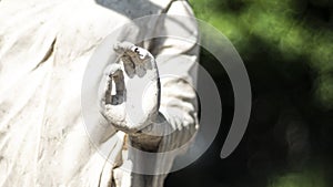 Statue of Buddha standing in meditation.Close up hand of statue Buddha.buddhism concept .peacefulness idea .lifestyle practise