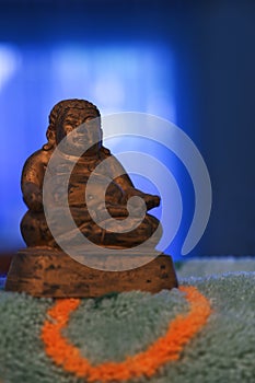 Statue of buddha, Xaunzang on carpet