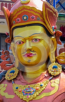 Statue of Buddhist deity Guru Rinpoche in Swayambhunath temple, Kathmandu, Nepal photo