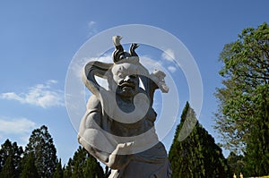 Statue in the buddhist temple of Iguassu Falls, Brazil. photo