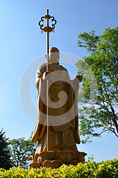 Statue in the buddhist temple of Iguassu Falls, Brazil. photo
