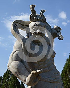 Statue in the buddhist temple of Iguassu Falls, Brazil. photo